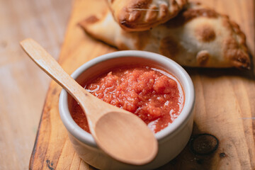 Salta meat empanadas on a wooden base