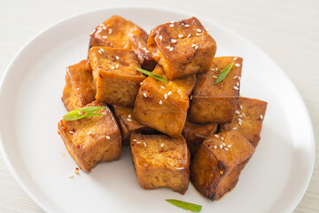 fried tofu with white sesame and teriyaki sauce