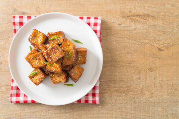 fried tofu with white sesame and teriyaki sauce