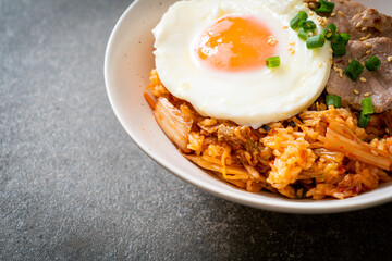 Kimchi fried rice with fried egg and pork