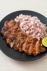 spicy grilled Jamaican jerk chicken with rice