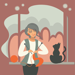 Fototapeta premium A caring sweet grandmother in quarantine knits warm clothes for children and grandchildren. Outside the window, golden autumn. Elderly woman in a cozy house with a cat. Flat vector in orange colors.
