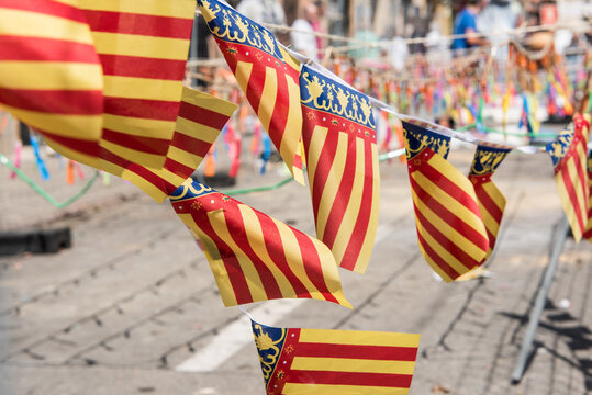 Flags of the Valencian community next to the mascleta prepared for the fallas.