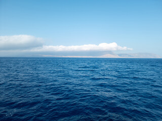 Fototapeta na wymiar Blue water and skies in Greece.