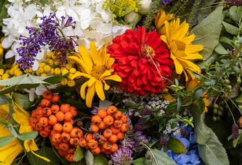 Traditional bouquet of flowers, herbs and fruits that are the symbol of summer