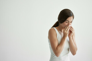 woman cold handkerchief runny nose health problems