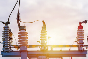 High voltage circuit electric breaker in a power substation.Closeup of high voltage insulators at new substation.Storage outdoors current transformer.