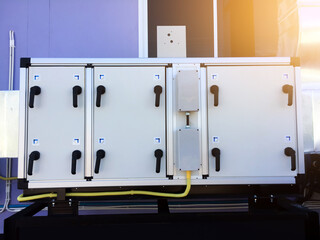 Indoor electrical control cabinets are installed outside the building for safety, security, and easy for operator control. Soft and selective focus.