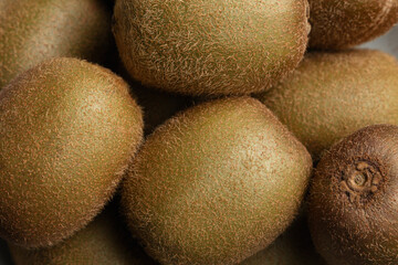 Pile of kiwi fruit as background. Healthy lifestyle concept
