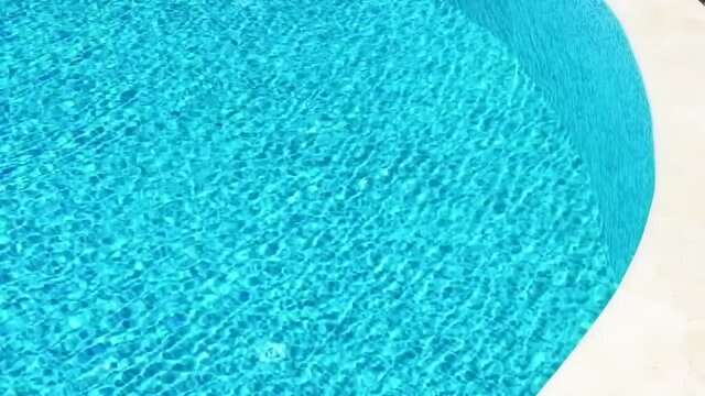 Swimming pool with crystal blue water as summer holiday and tropical paradise vacation at poolside b-roll background. High quality 4k footage