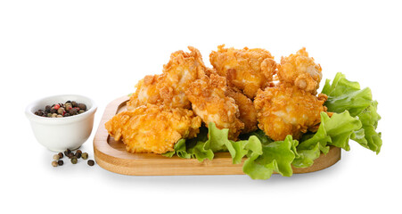 Board with tasty popcorn chicken and spices on white background
