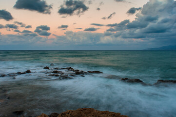 Fototapeta na wymiar Sea waves crash on the rocks on the shore