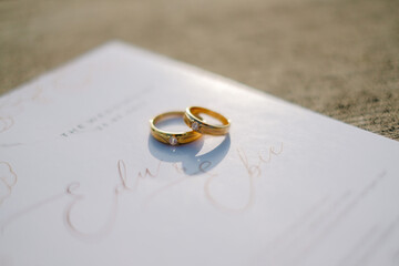 wedding rings on the table