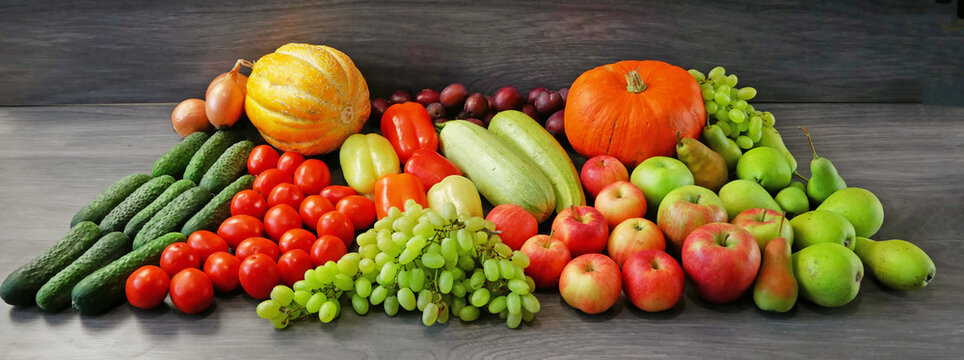 many different fruit and vegetables, green glocery shop, healthy fresh colored fruits and vegetables background delivery
