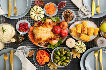 Beautiful table setting with traditional Thanksgiving food