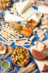 Assorted table of typical Spanish tapas to share with friends 