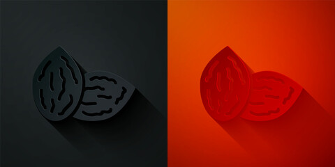 Paper cut Seeds of a specific plant icon isolated on black and red background. Paper art style. Vector