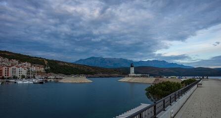 Obraz premium Lighthouse in the Lustica Bay at sunset, Montenegro