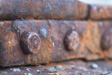 Old rusty rails close up background.