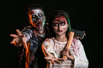 Scary zombies on dark background