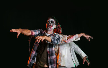 Scary zombies on dark background