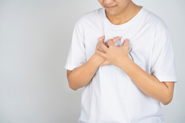 Hands holding chest with symptom heart attack disease
