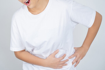 Woman has stomachache isolated over white background.