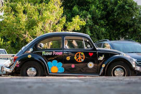 MATALA, GREECE - OCTOBER 18 2012: A painted hippie car