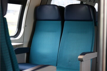 Empty Blue Seats inside Italian Train 