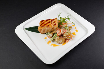 grilled salmon with rice and vegetables