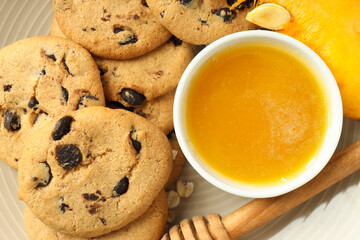 Concept of tasty food with pumpkin cookies, close up