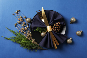 New Year table setting on blue background