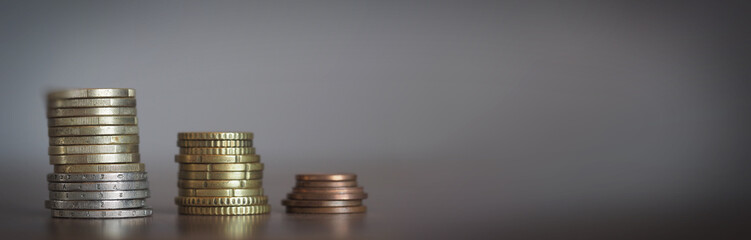 euro cent coins stacked, concept finance, business idea, wide banner with free space for text