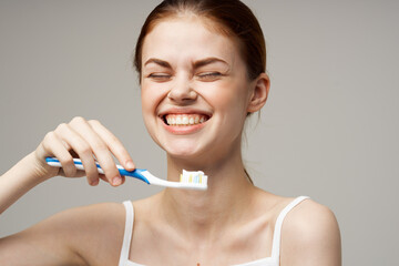 cheerful woman toothbrush hygiene toothpaste