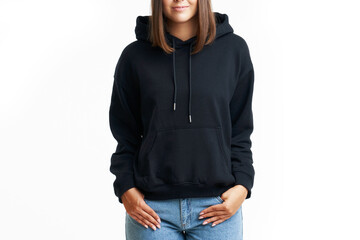 Young woman in black hoodie isolated