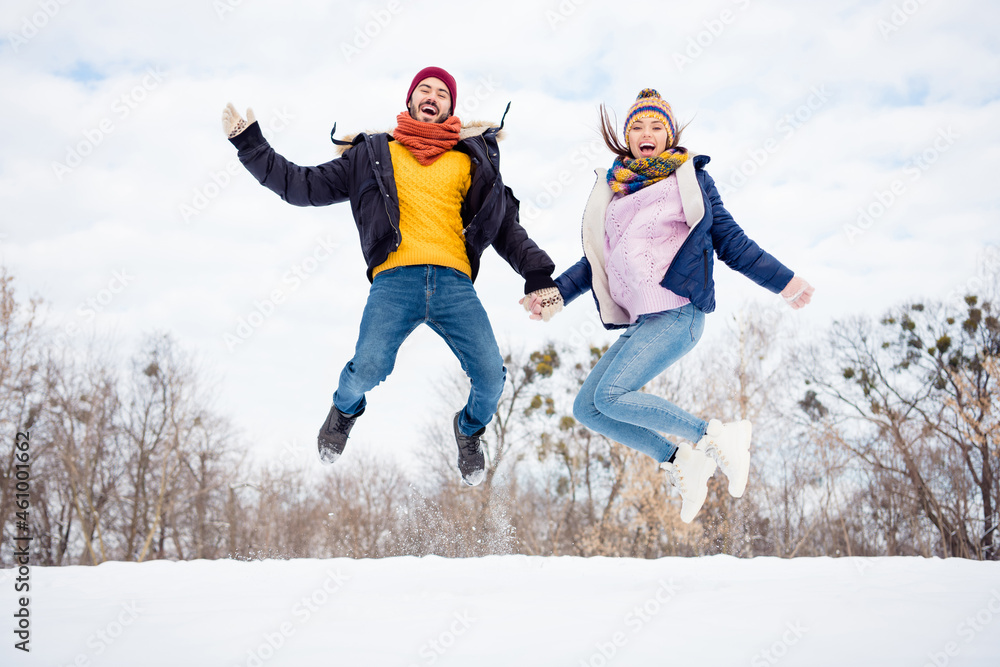 Poster Full size photo of carefree crazy guy lady hold arms have fun open mouth smile enjoy free time weekend outdoors