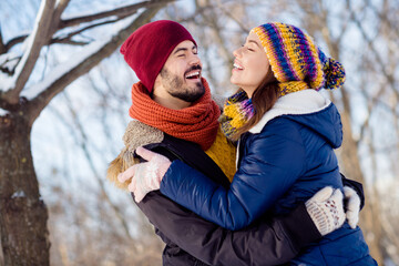 Photo of excited couple happy positive smile hug cuddle embrace comfort cozy love romantic walk...