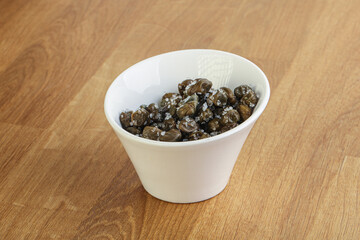 Salted marinated capers snack appetiser
