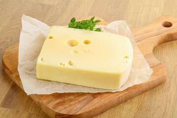 Maasdam cheese over the board
