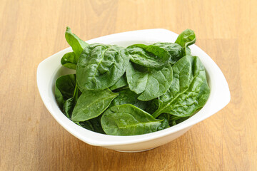 Fresh green spinach leaves in the bowl
