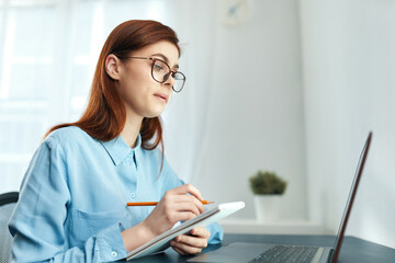 woman in front of laptop work technology communication official