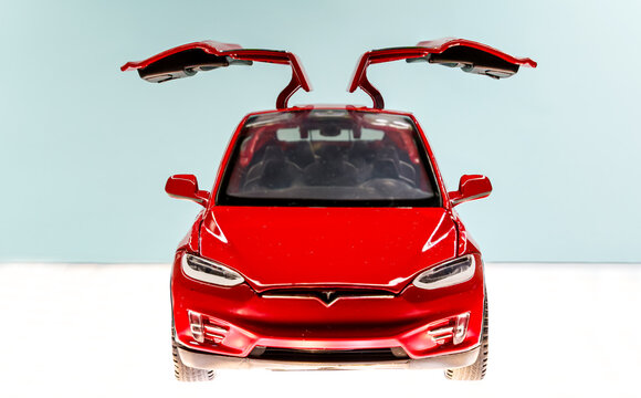 Barcelona, Spain. October 21: Red Tesla Model X toy car with open falcon wings doors