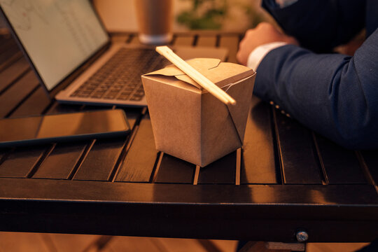 Take away food container on table in balcony