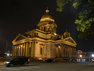 Fototapeta na wymiar St. Isaac's cathedral dome, Rostral column and Palace bridge at night, Saint Petersburg, Russia 