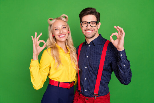 Photo of young lovely couple show okay alright sybol perfect ideal recommend isolated over green color background