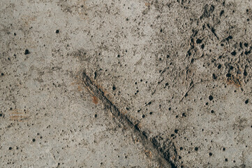 Close-up of the old concrete pavement. Dirty concrete floor. The texture of old concrete.