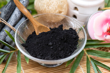 Bamboo Charcoal and powder on nature background.