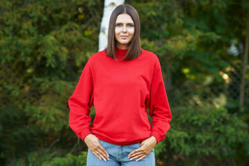 Young woman in red blouse