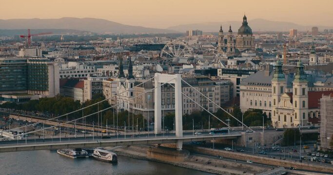Budapest, Erzsebet bridge from Gellert Hill with Danube river at sunset