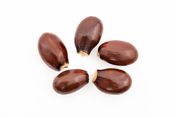 Lychee or Litchi chinensis seeds  isolated on white background.